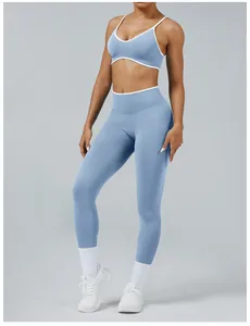 Detailed view of a two-tone light blue and white yoga set featuring high-waist leggings