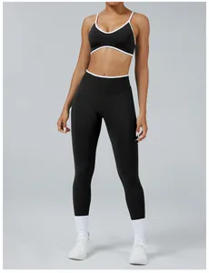 Two-piece color-block yoga set with black sports bra and high-waist leggings