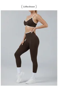 Detail of coffee brown two-piece yoga set with contrast white piping on bra and leggings