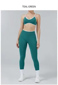 Full-body view of women's teal and white color-block yoga set for fitness and running
