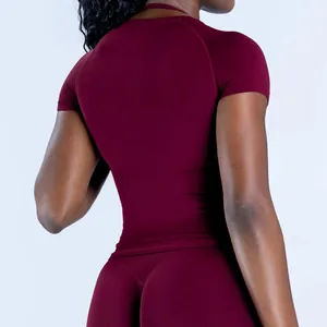 Detail view of a wine red seamless quick-dry fitness T-shirt for women