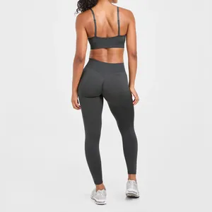 Back view of seamless charcoal yoga set featuring double strap sports bra and leggings