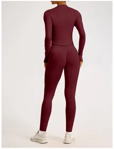 Back view detail of burgundy ribbed seamless yoga set showing high waist and lift effect
