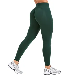 Leggings da yoga verde scuro senza cuciture a vita alta con effetto push-up.