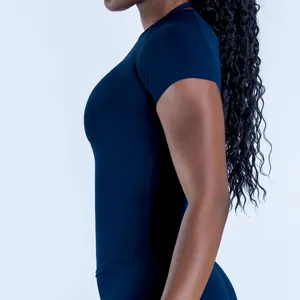 Professional side view detail of navy blue seamless quick-dry athletic yoga top on model