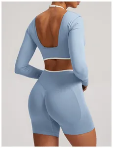 Back view of a blue seamless yoga set showing the open back and ribbed fabric texture