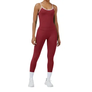 Women's burgundy two-piece yoga sports set featuring white contrast trim and slim fit