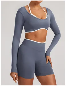 Seamless blue long sleeve yoga set with white trim detail for women's fitness gear