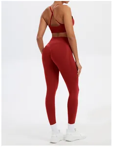 Back view of a red seamless yoga set featuring a cross-strap bra and lifting leggings