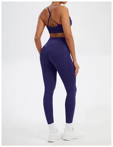 Detailed rear view of a deep purple seamless yoga set with sports bra and leggings