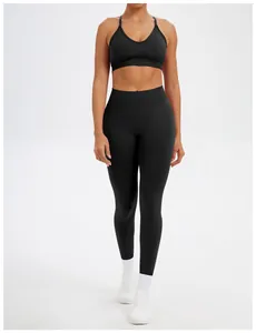 Professional full body view of a seamless black yoga set on a model for gym or running
