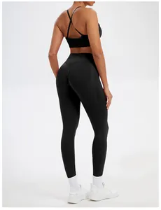 Detailed back view of high-waist seamless black yoga leggings with supportive sports bra