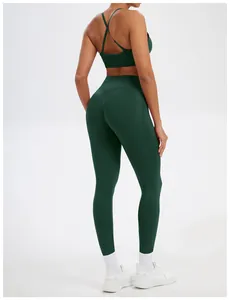 Back view of seamless dark green yoga set featuring high-waisted leggings and sports bra