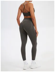 Back view of seamless dark grey yoga set including sports bra and high-waist leggings