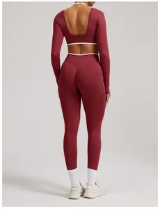 Back view of wine red seamless yoga set featuring open back top and high waist leggings
