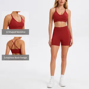 Women's red seamless yoga set featuring a U-neck sports bra and high-waist shorts