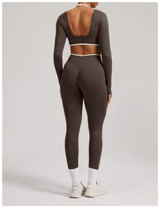 Back view of seamless brown long-sleeve yoga set with open back design and leggings