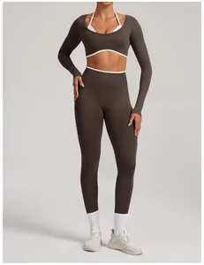 Seamless ribbed brown yoga set with long sleeve top and high waist leggings for fitness