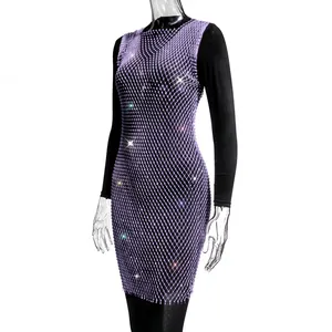 Detail view of purple rhinestone fishnet dress with sparkling mesh texture