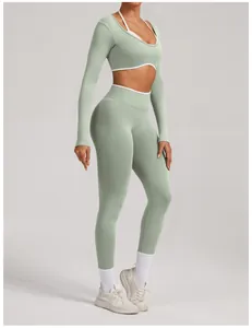 Detailed view of a sage green seamless long sleeve yoga set with high waist compression leggings.