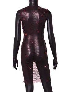 Close-up back view of a black fishnet mesh dress decorated with sparkling red rhinestones