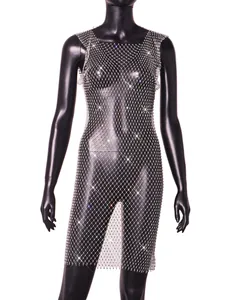 Close-up detail of sparkling silver rhinestone mesh fishnet dress on black mannequin
