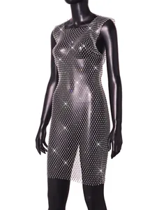 Detail of sleeveless rhinestone fishnet dress with sparkling mesh on mannequin
