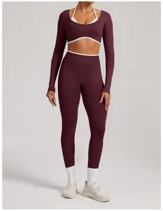 Detail view of seamless burgundy yoga set with long sleeve top and leggings