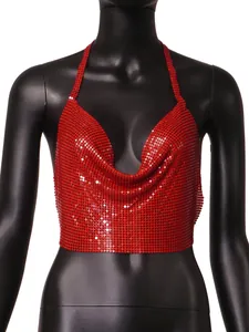 Detail showing the intricate metallic sequin mesh texture of the red halter top