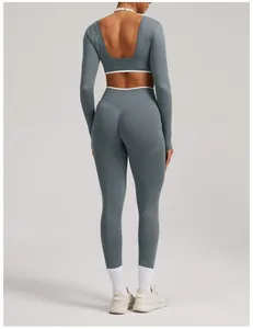 Back view of a seamless yoga set featuring a long-sleeve open-back top and leggings.