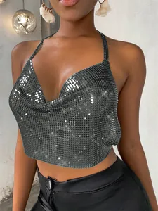 Detail view of a sexy metallic sequin halter top with shimmering texture and cowl neck