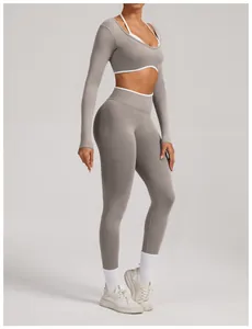 Full body detail of a grey seamless long sleeve yoga set showing high waist leggings