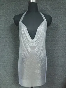 Detail of silver metallic sequin halter neck sexy nightclub mini dress on mannequin