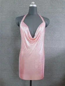 Close-up of a pink metallic sequin halter dress with cowl neck shown on mannequin