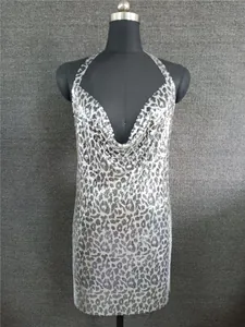 Detail view of sexy leopard print metallic sequin cowl neck halter dress for party