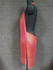 Side view of sexy pink metallic sequin halter dress on mannequin showing backless detail