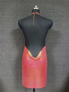 Back view of sexy pink metallic sequin halter dress on mannequin