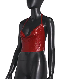 Macro detail view of sexy red metallic sequin halter top displayed on a black mannequin.