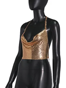 Close-up detail of sexy gold metallic sequin halter backless crop top for women nightclub