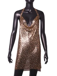 Detail view of a shimmering leopard print metallic mesh halter dress on a mannequin