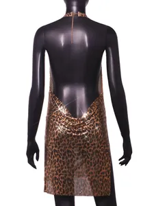 Back view of leopard print metallic chainmail dress showing backless detail and texture.