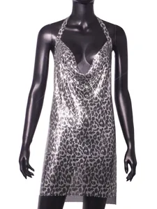 Detailed view of sexy silver metallic sequined halter dress with leopard print pattern