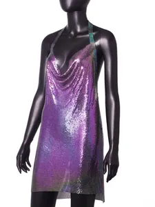 Detail view of a purple iridescent metal sequin halter dress on a black mannequin.