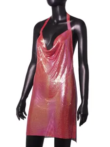 Close-up detail of the shimmering pink metallic sequin fabric on the sexy halter mini dress.