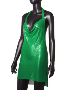 Close-up detail of sexy green metallic sequin halter mini dress with shimmering finish