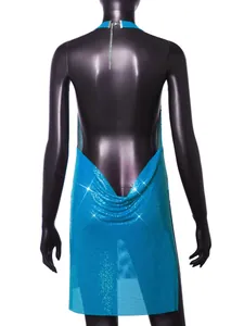 Back view of a turquoise metal mesh halter dress with sparkling sequin details