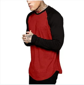 Detailed side view of a red and black raglan long sleeve t-shirt on a male model.