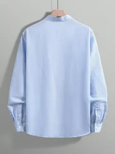 Back view detail of men's blue and white striped long sleeve shirt with mandarin collar