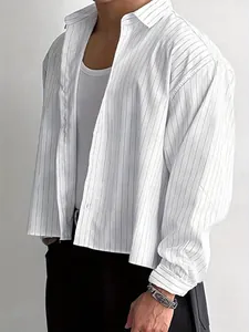 Close-up detail of white men's long sleeve shirt with classic vertical black stripes.