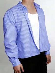 Close-up detail of a men's blue and white vertical striped long-sleeved casual shirt.